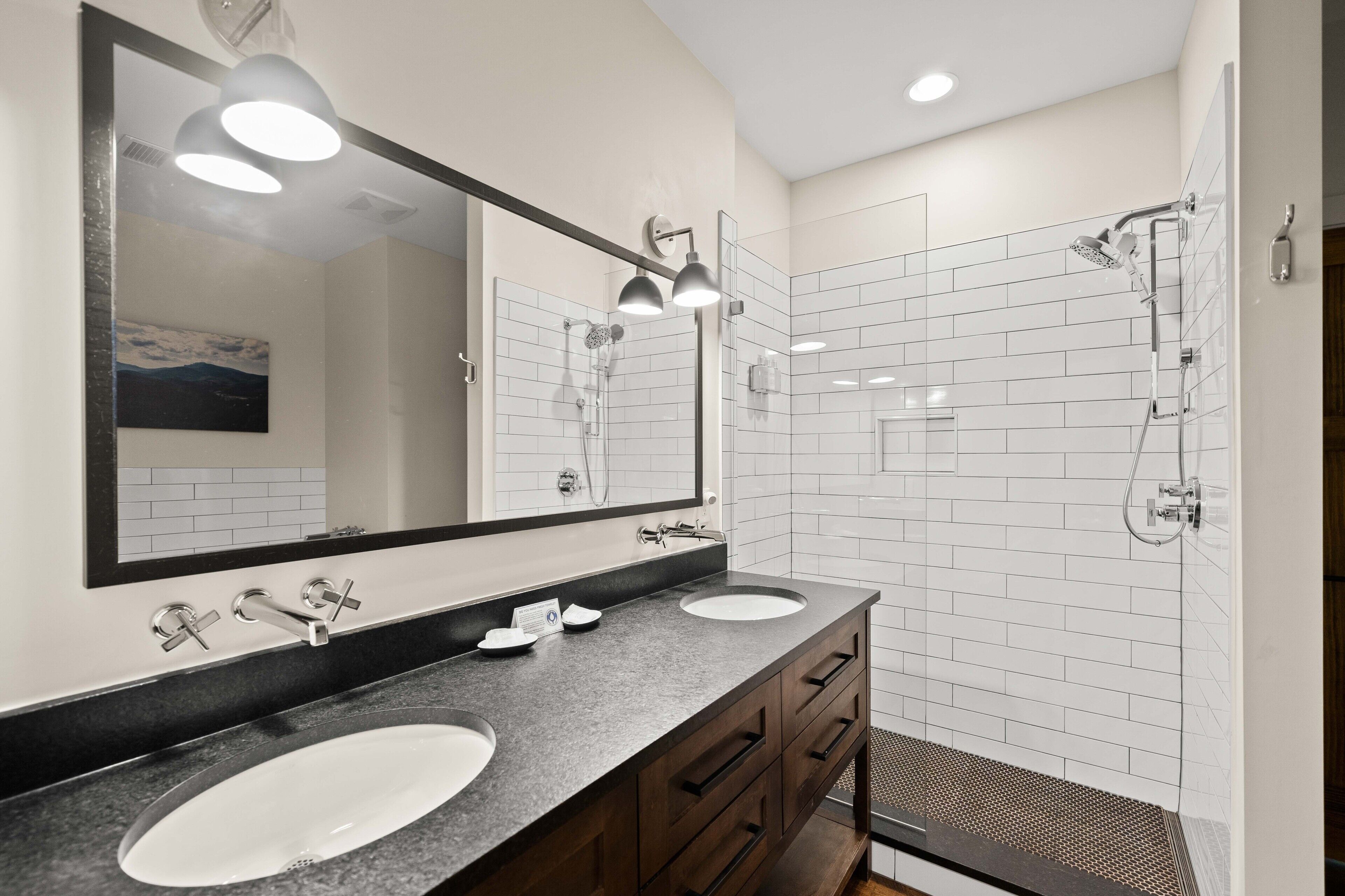 suite, 1 king bed with sofa bed | bathroom | separate bathtub and shower, hair dryer, towels