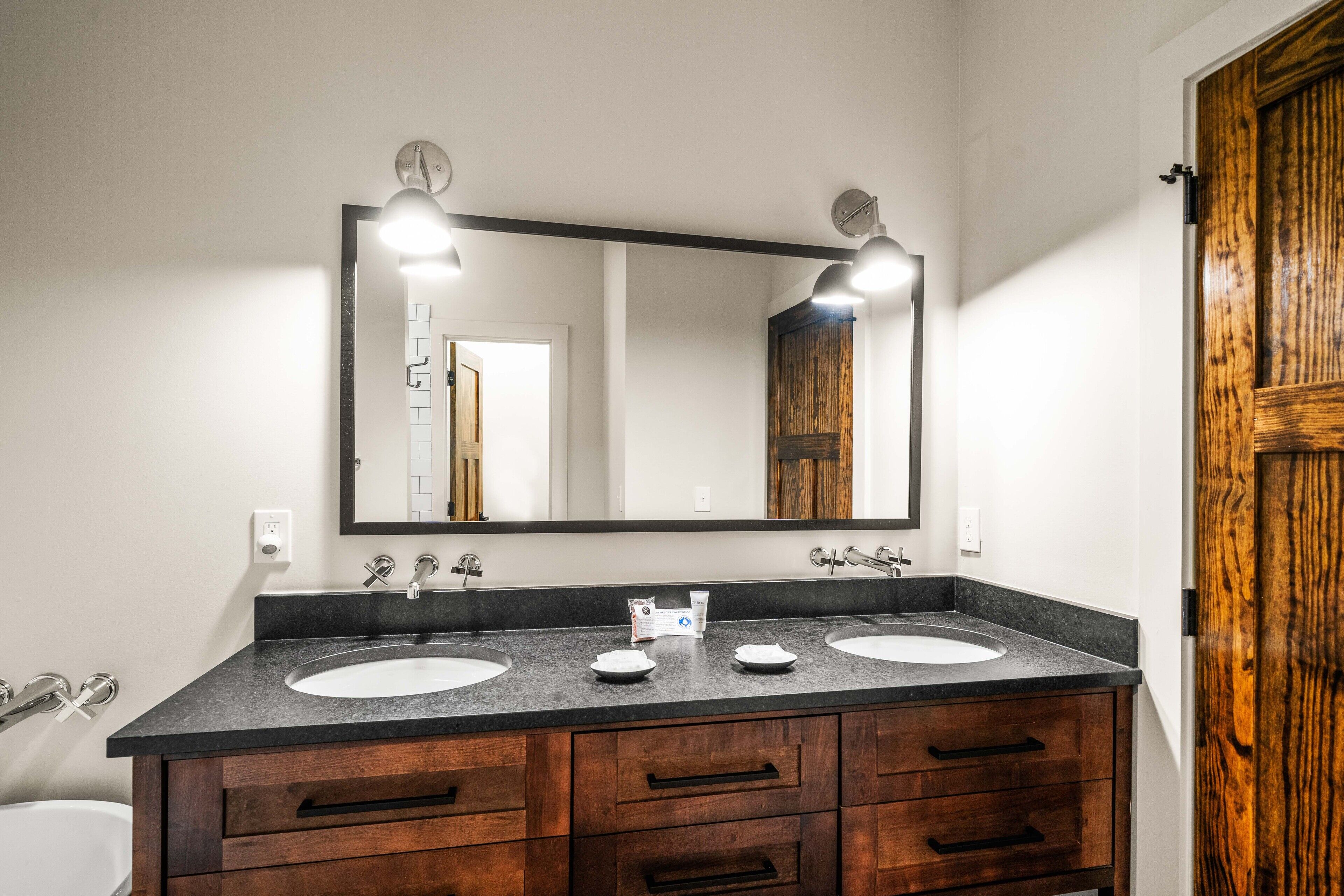 deluxe room | bathroom | separate bathtub and shower, hair dryer, towels