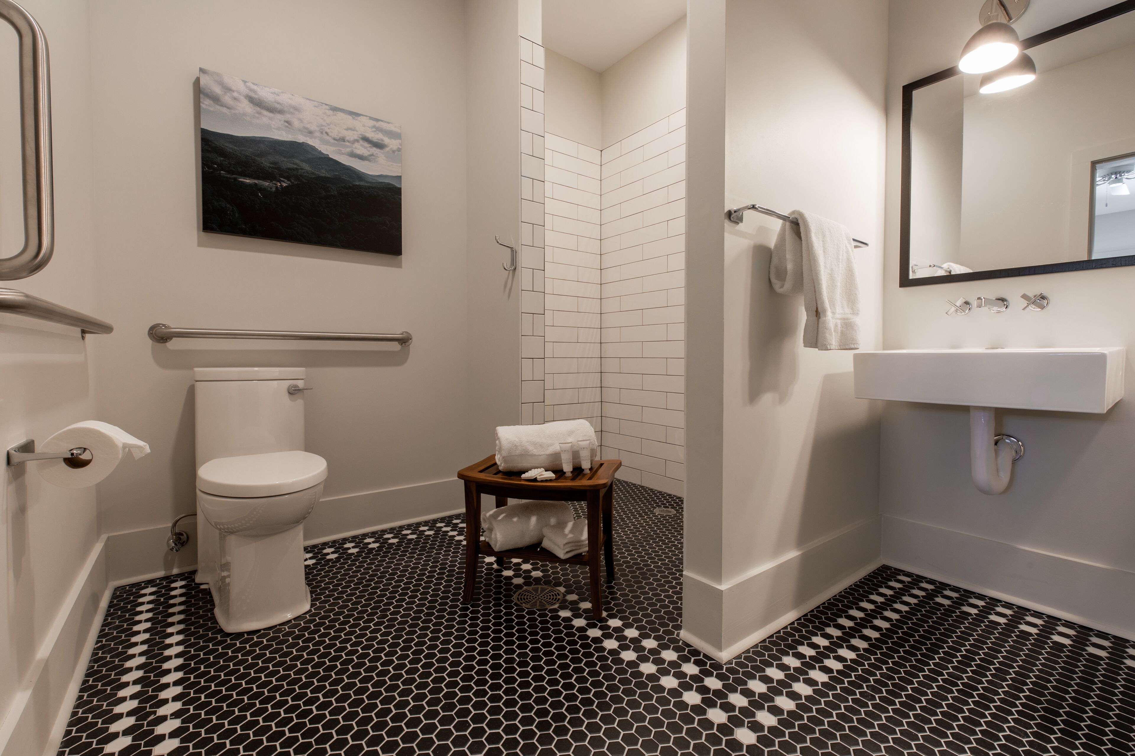 comfort room | bathroom | separate bathtub and shower, hair dryer, towels