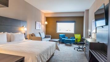 Suite, 1 habitación | Caja de seguridad en la habitación, escritorio y cortinas blackout