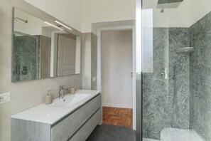 Shower, hair dryer, bidet, toilet paper