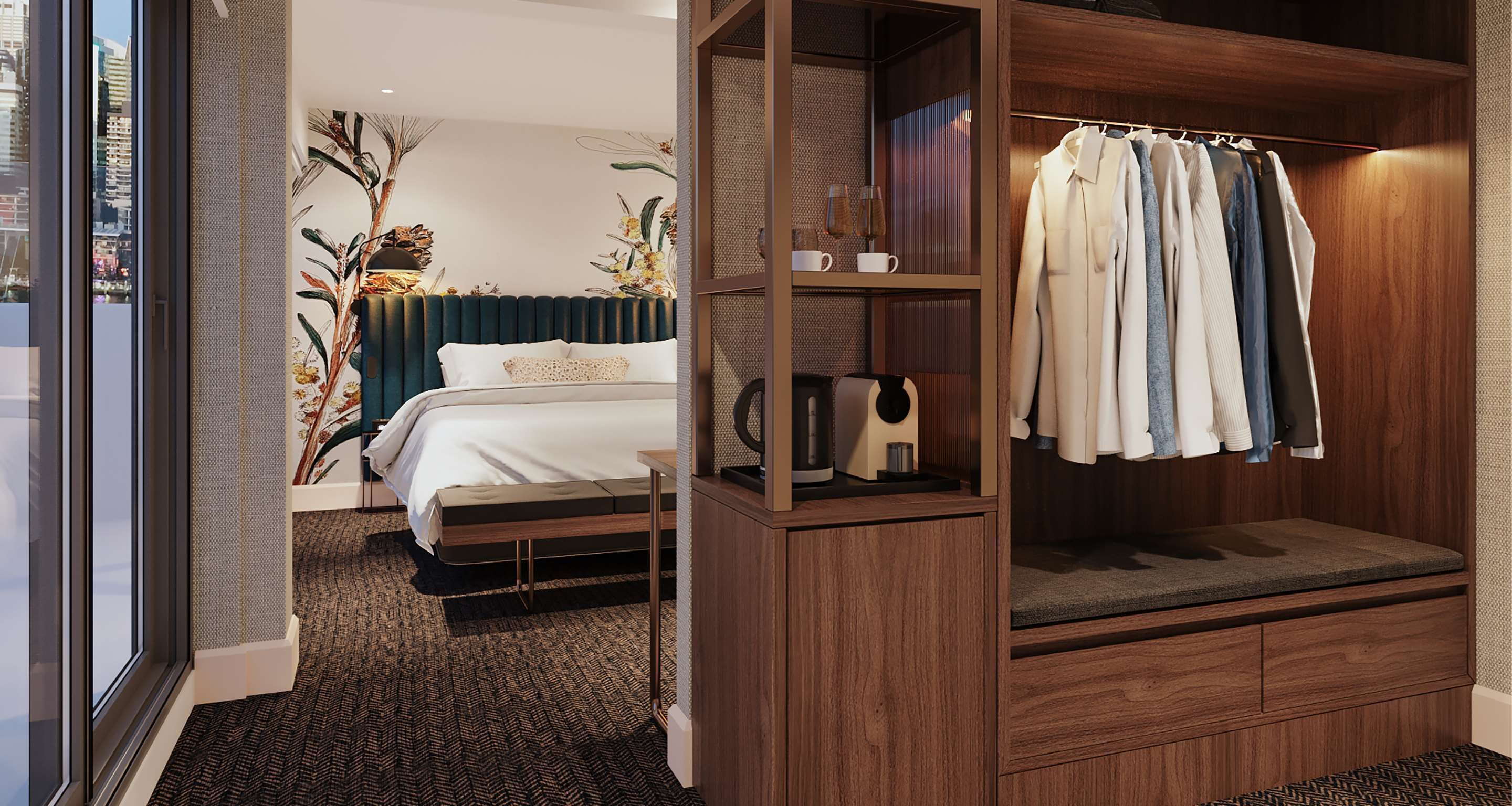 A hotel room with a bed, a walk-in closet, and a view of the city.