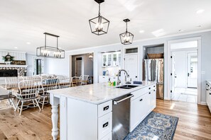 Fridge, microwave, oven, stovetop - Dog-friendly, lakefront house with beach access, dock, AC, W/D, patio, & firepit (St. Germain)