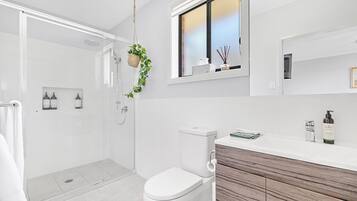 Shower, hair dryer, towels, soap