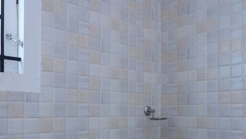 Shower, free toiletries, towels, soap