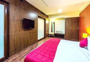 Desk, laptop workspace, bed sheets