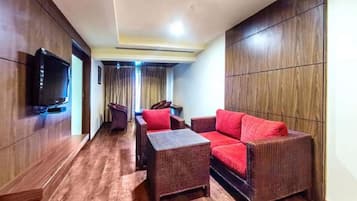 Habitación Elite | Zona de estar | Una televisión