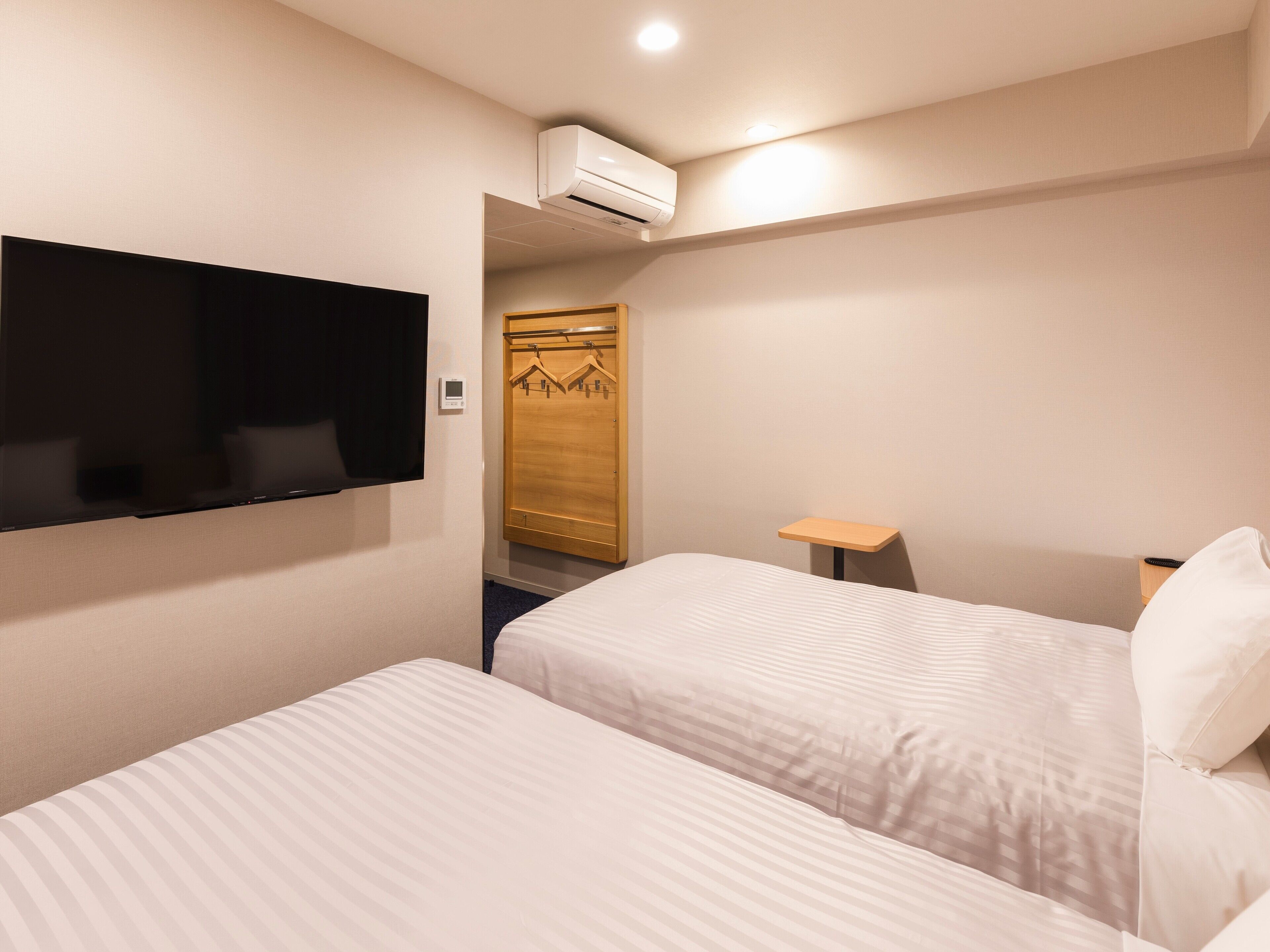 down duvets, desk, blackout curtains, iron/ironing board