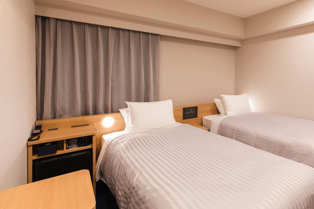Down duvets, desk, blackout curtains, iron/ironing board (on request)