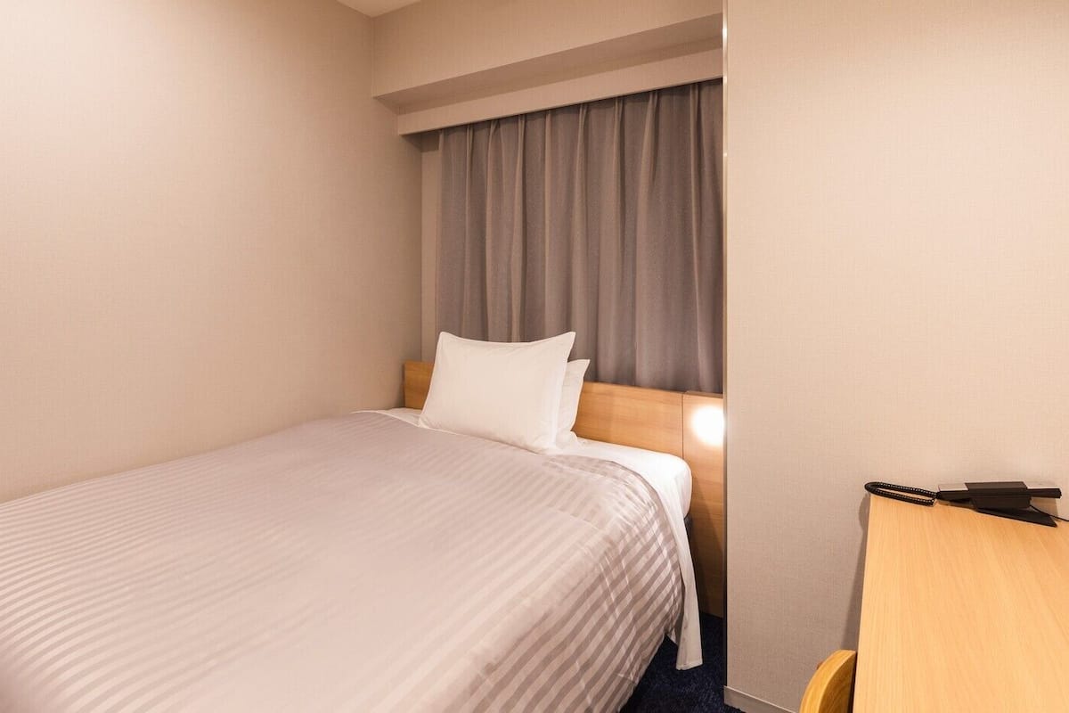 Down duvets, desk, blackout curtains, iron/ironing board (on request)