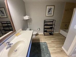 Bathtub, jetted bath, hair dryer, towels