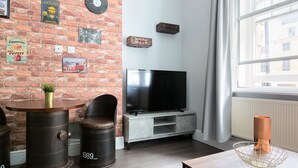 Comfort-Apartment | Wohnbereich | Flachbildfernseher