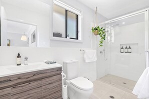 Shower, hair dryer, towels, soap