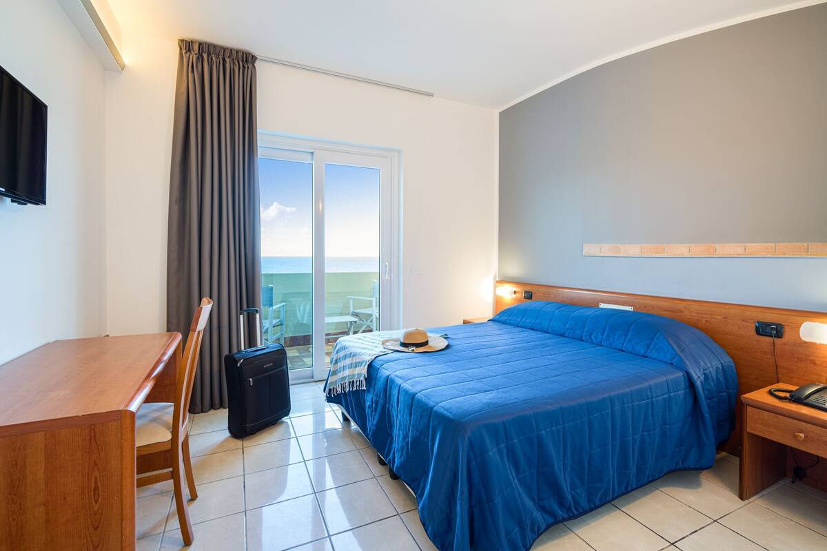 Double or Twin Room, 1 Bedroom, Sea View | In-room safe, blackout curtains, free WiFi, bed sheets