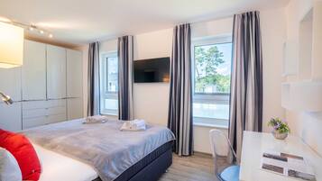 2 quartos, escrivaninha, berço de viagem, Wi-Fi