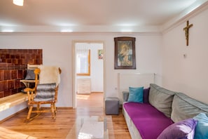 Family House, 2 Bedrooms, Fireplace, Mountainside (Farmhouse Blackberry Pool&Wellness) | Living area | Flat-screen TV, fireplace, stereo - Farmhouse Blackberry Pool&wellness (Vransko)