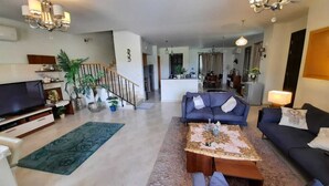 Villa familiar | Área de sala de estar