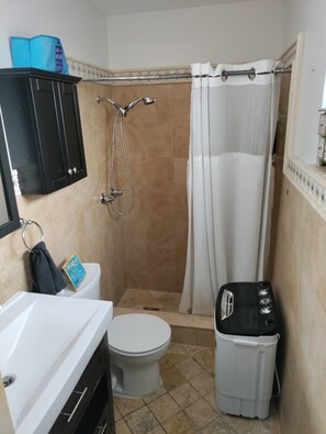 Shower, hair dryer, towels, soap