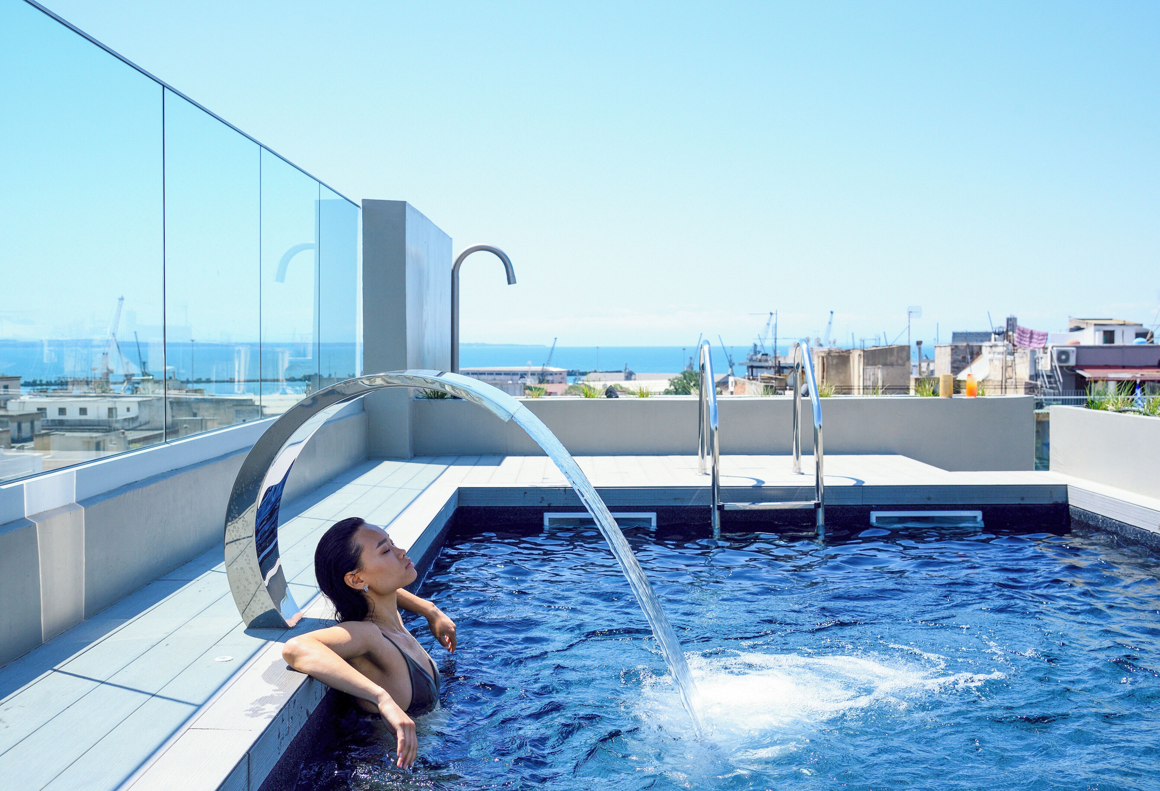 Seasonal outdoor pool, pool umbrellas, pool loungers