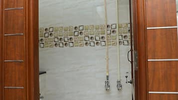 Shower, rainfall showerhead, towels