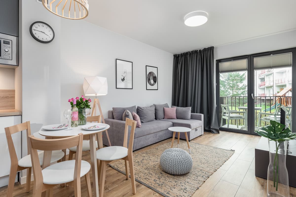 Apartment, 1 Bedroom, Balcony | 4 bedrooms, bed sheets