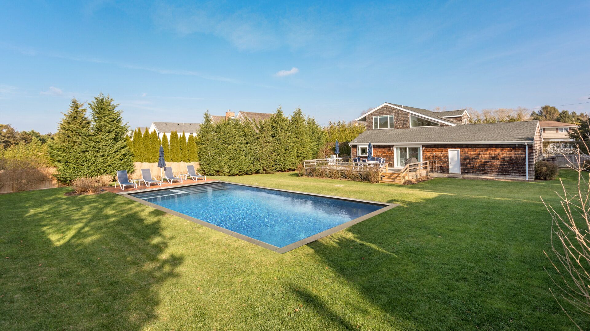 Traditional-style home with private pool, back deck, ample natural light,...