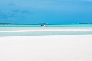 On the beach, sun loungers, beach towels - February Point Oceanfront Villa, New Owner Rates, Includes Free Day Boat Rental  (Georgetown, BS)