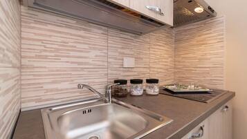 Fridge, microwave, electric kettle, toaster