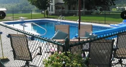 Lovely 4 bedroom 3 bath farmhouse with pool, located in Cooperstown, NY