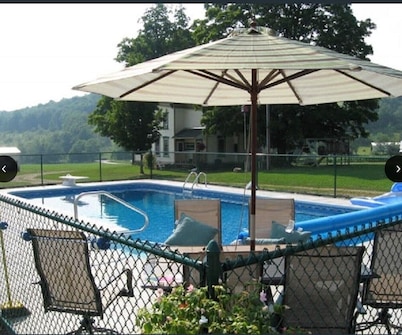 Lovely 4 bedroom 3 bath farmhouse with pool, located in Cooperstown, NY 