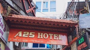 A25 Hotel with a red awning and a signboard. - Hanoi Palace Hotel (Hanoi)