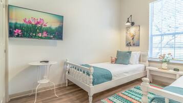 3 bedrooms, desk, iron/ironing board, travel crib