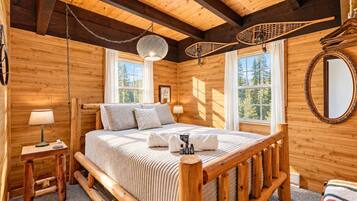 Chalet Getaway: Wood-paneled bedroom