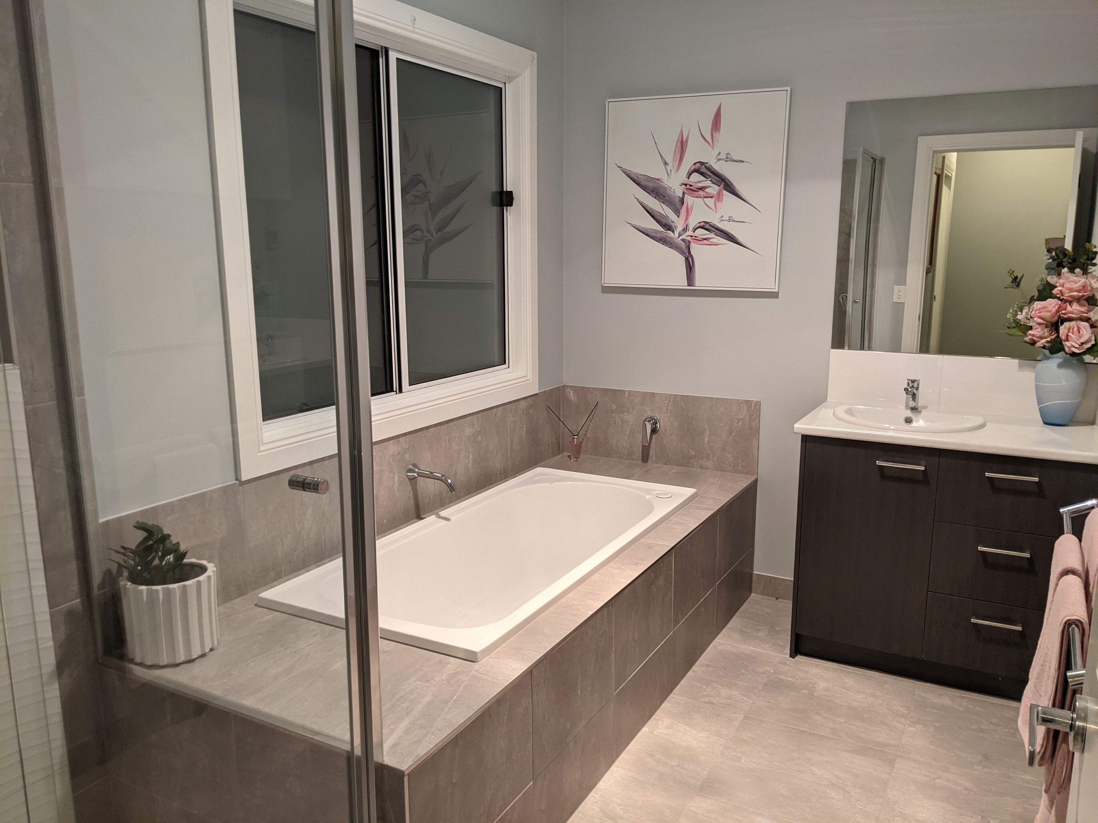 Bathtub, hair dryer, towels, soap