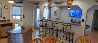 An oasis featuring a heated pool, where quiet luxury meets backyard tranquility.