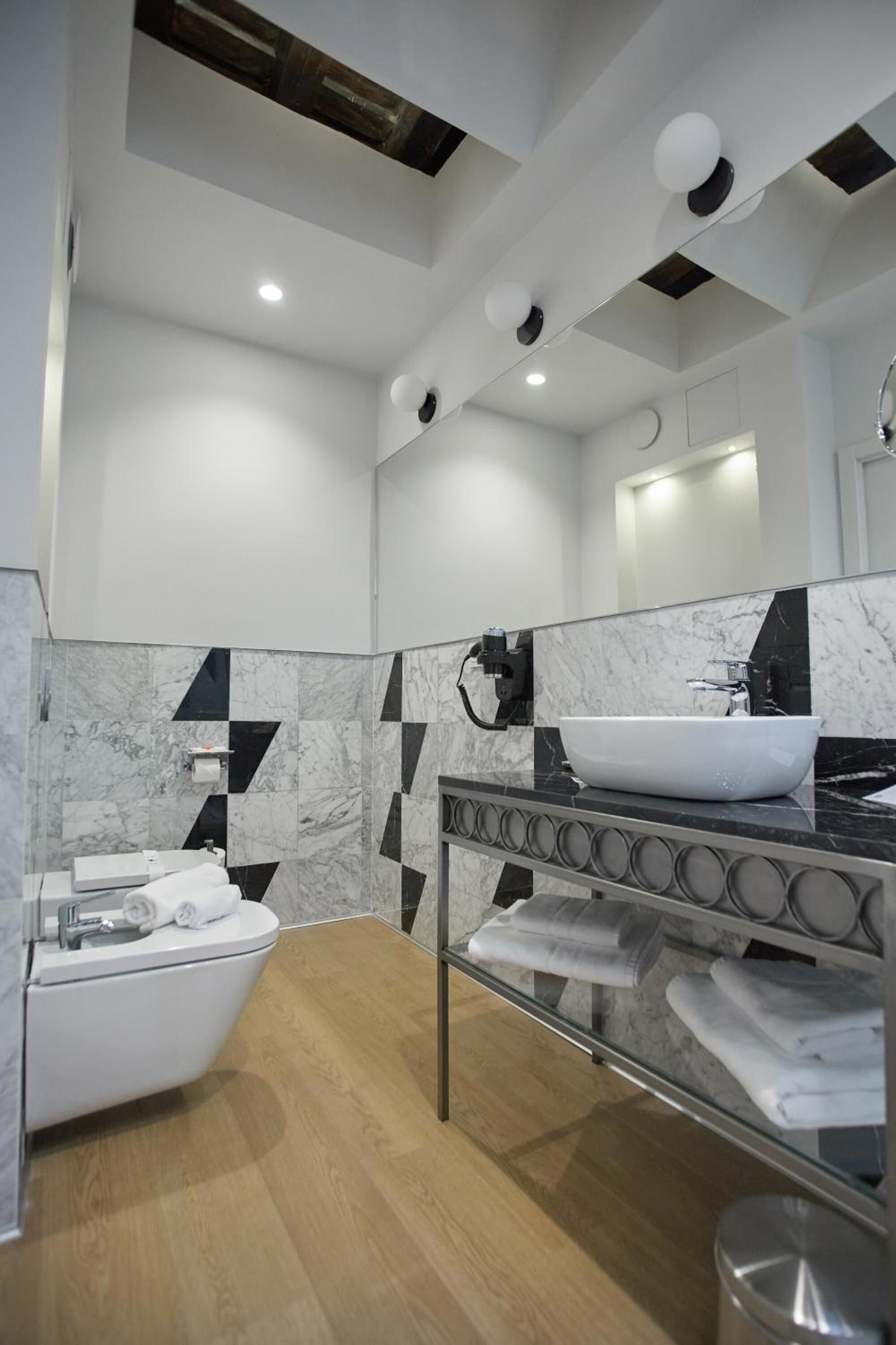 hair dryer, bidet, towels