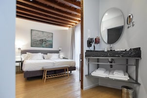 Superior Double Room | Minibar, in-room safe, individually decorated, desk