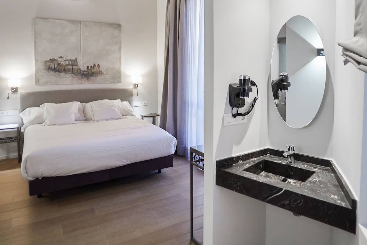 hair dryer, bidet, towels