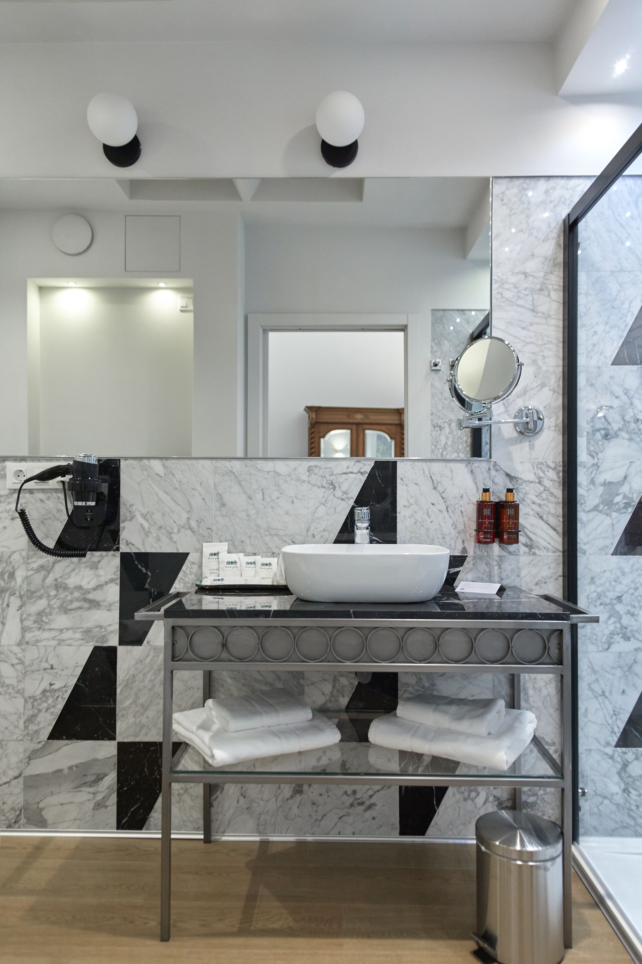 deluxe studio suite | bathroom | hair dryer, bidet, towels