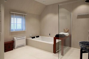 Bathtub, free toiletries, hair dryer, bathrobes