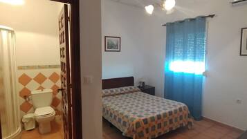 1 dormitorio, tabla de planchar con plancha, wifi gratis y ropa de cama