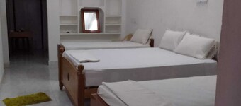 Parisha Residency - Temple Side Hotel