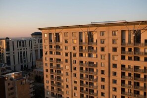 A high-rise residential building with multiple balconies and a modern architectural design. - Westay Westpoint Apartments (Johannesburg)