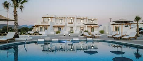 Seasonal outdoor pool, pool umbrellas, pool loungers