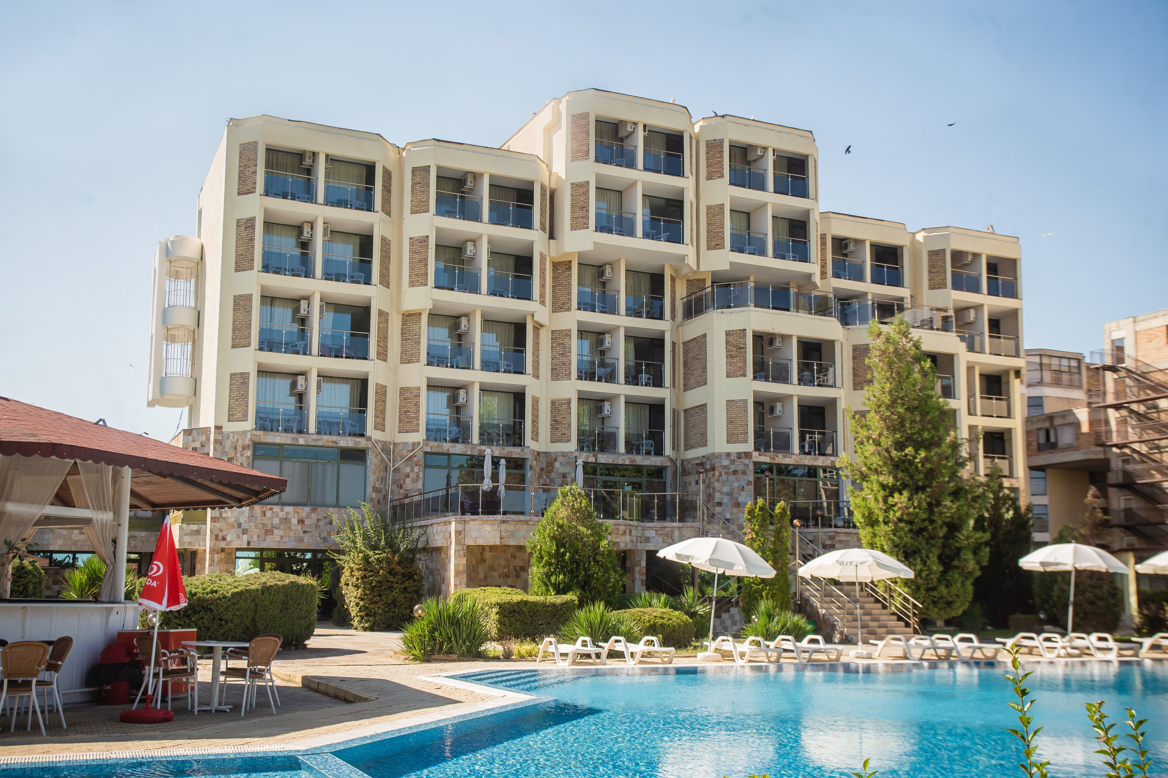 Seasonal outdoor pool, pool umbrellas, sun loungers