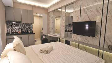 Premium bedding, pillow-top beds, free minibar, individually decorated