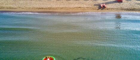 Private beach, rowing