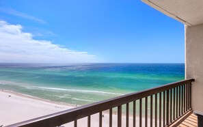 A balcony with a view of the ocean and beach. - Ocean Breezes + Gulf Front Resort, Pools & Tennis (Panama City Beach)
