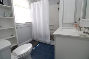 Combined shower/tub