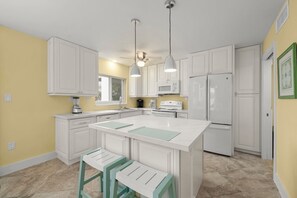 Fridge, microwave, oven, stovetop - Island Beach Club #210A is a 2/2 vacation rental on Sanibel Island. (Sanibel)